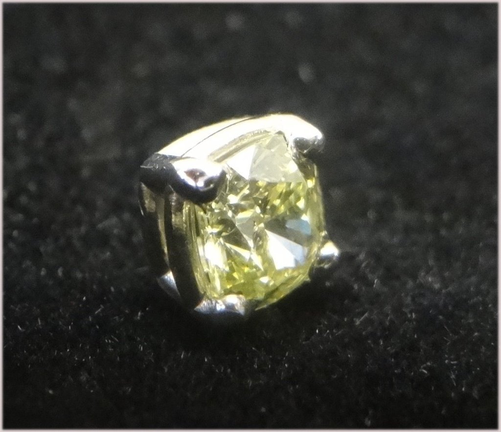 Gia certified fancy yellow diamond .66 carat