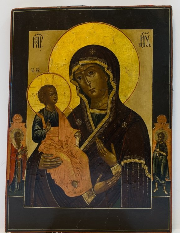 A russian icon of mother of god with three hands