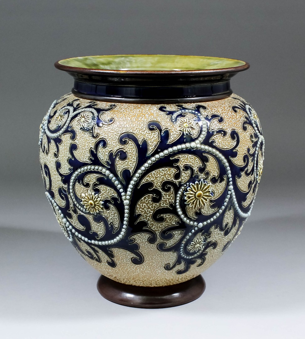An early 20th Century Royal Doulton stoneware jardiniere modelled