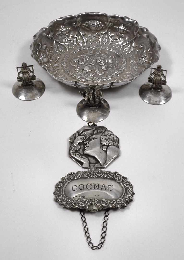 A late Victorian oval silver embossed sweetmeat dish