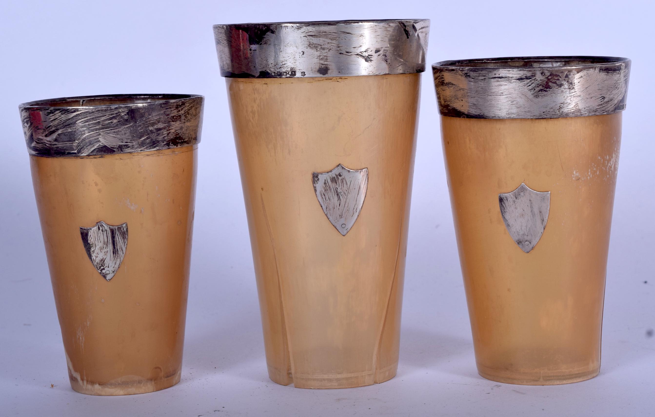 A set of three scottish silver mounted horn beakers,