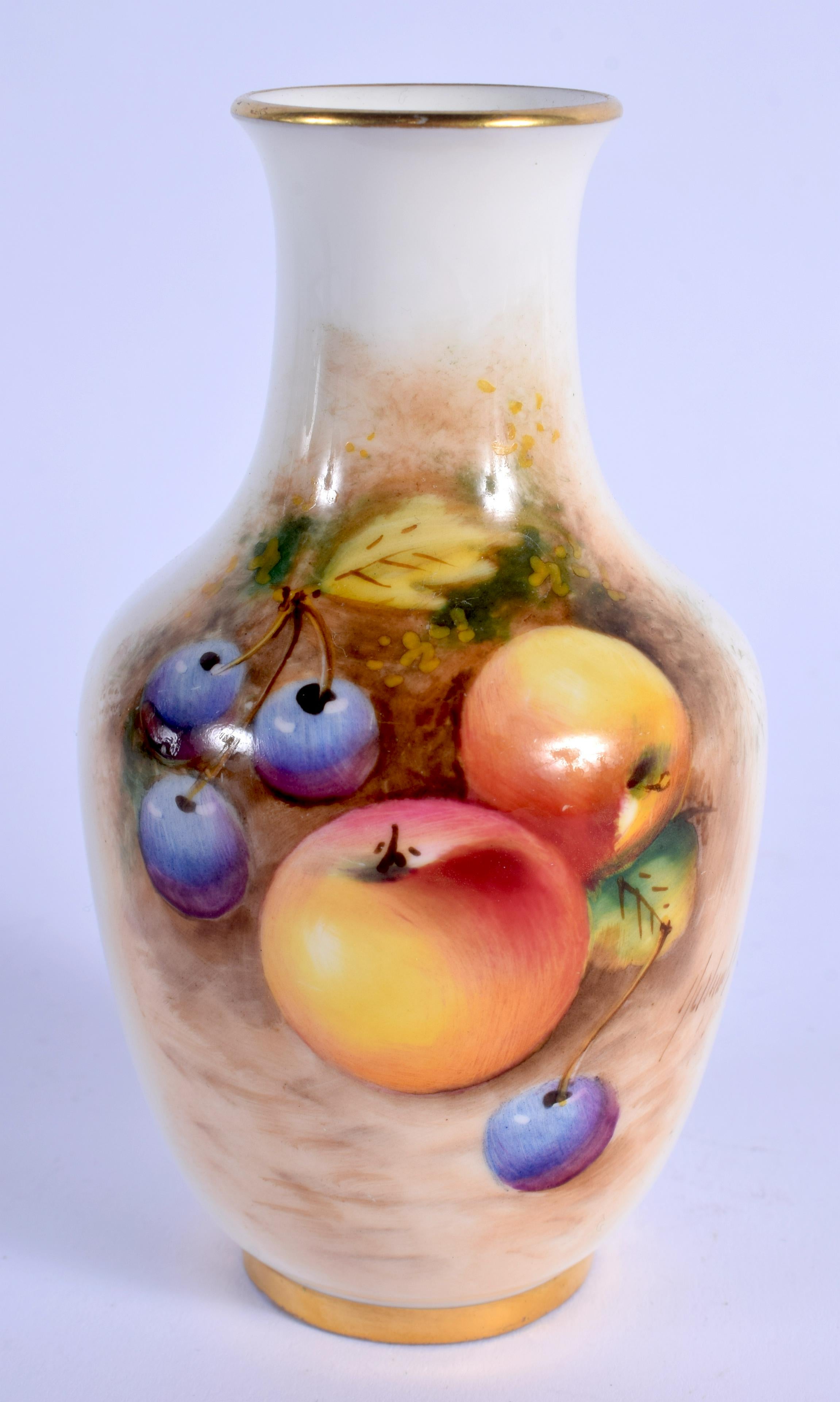 A ROYAL WORCESTER VASE painted with fruit by Roberts,