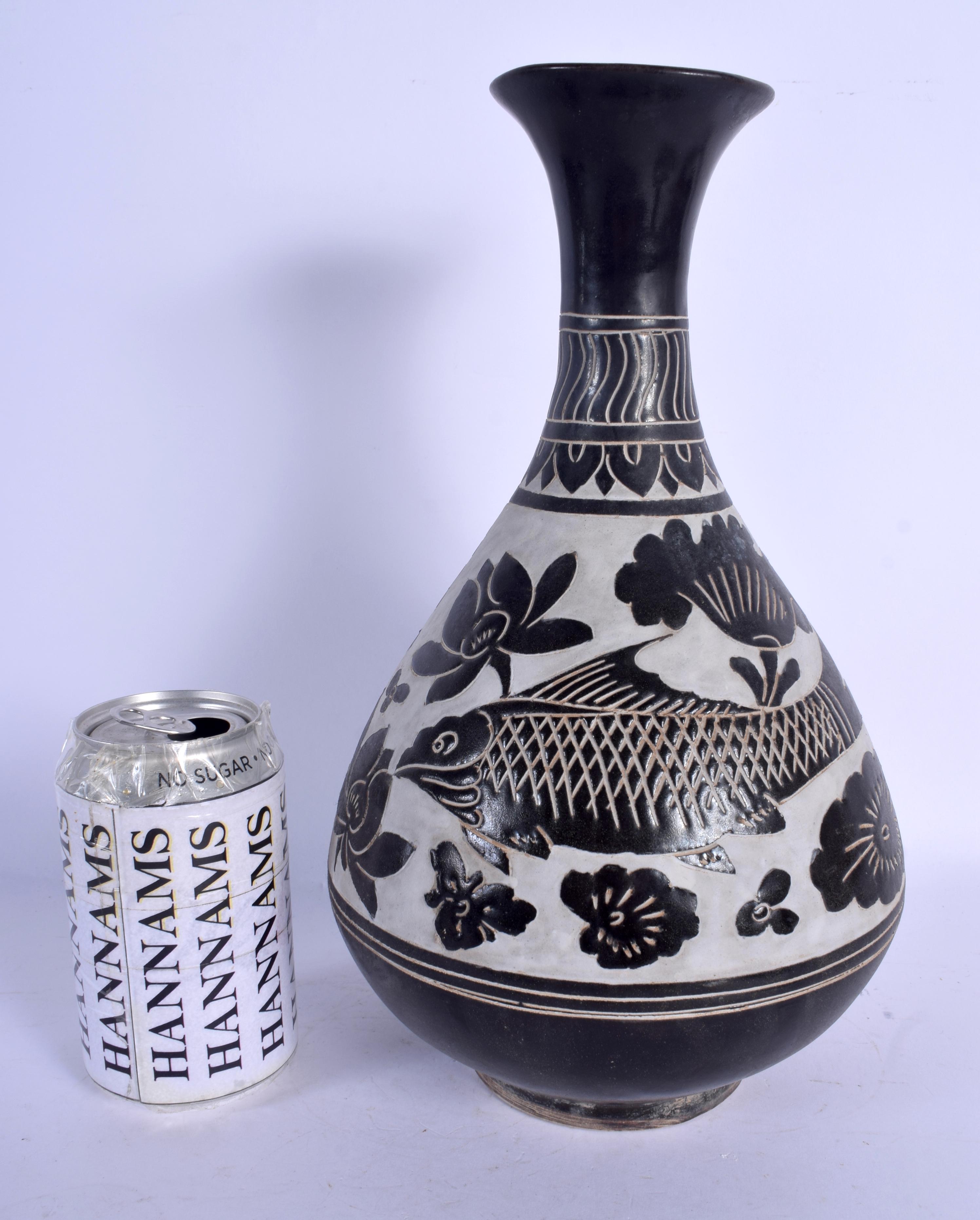 A CHINESE MING STYLE BULBOUS POTTERY VASE 20th Century,