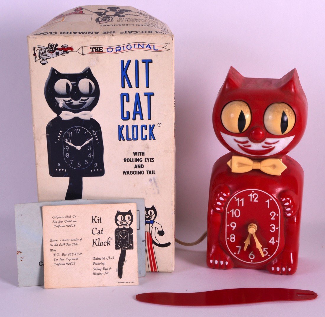 A BOXED 1980S NOVELTY KITCHEN CLOCK advertising Kit Cat