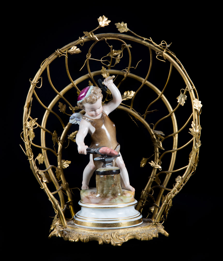 Meissen porcelain putti figure with arbor