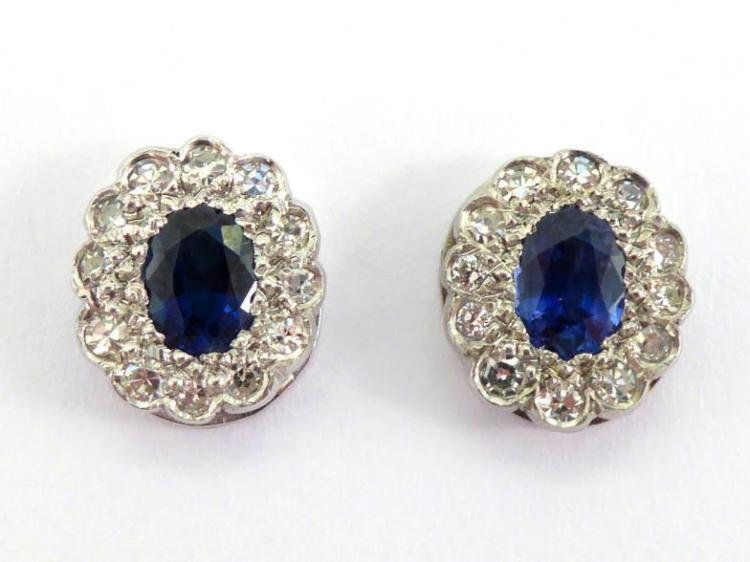 A pair of sapphire and diamond cluster ear studs