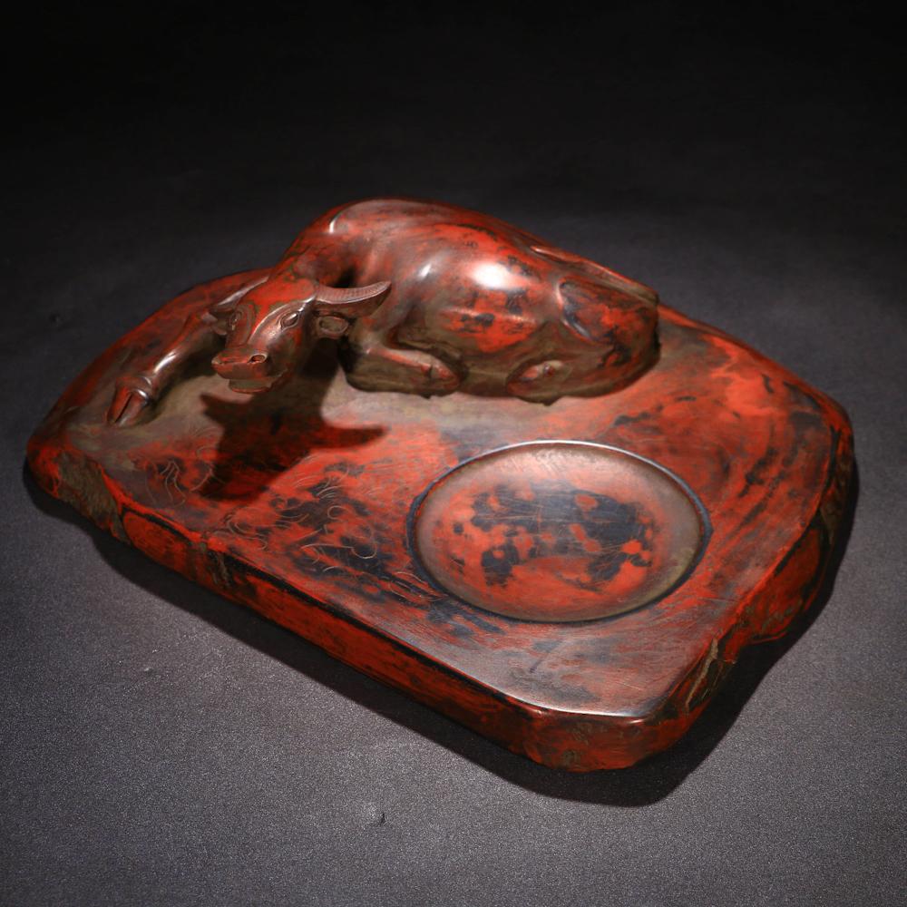 A Chinese Carved Duan Stone Cinnabar Inkstone
