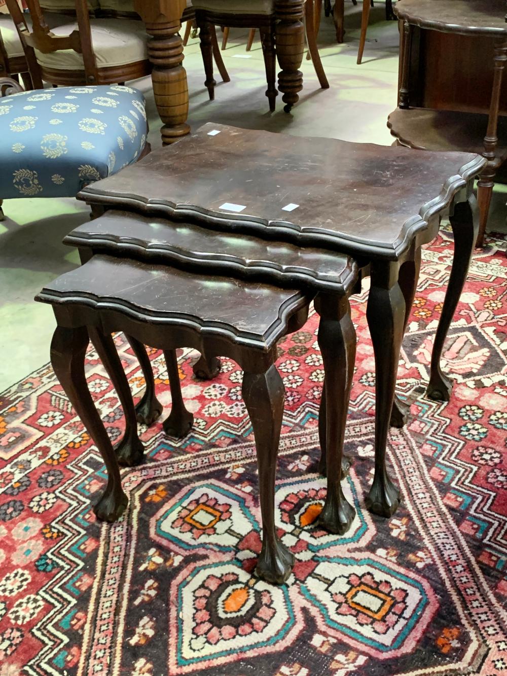 Nest of wooden tables, approx 50cm H x 59cm W x 39cm D and smaller
