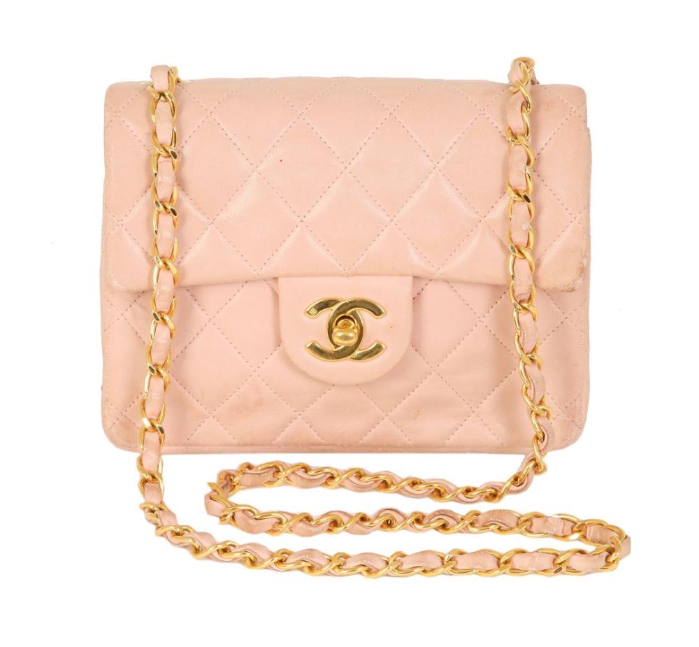 A CHANEL QUILTED MINI FLAP BAG