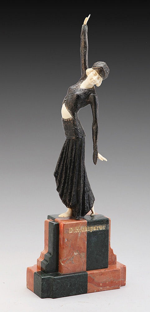 AN ART DECO STYLE SCULPTURE 'FOOTSTEPS' AFTER DEMETRE CHIPARUS