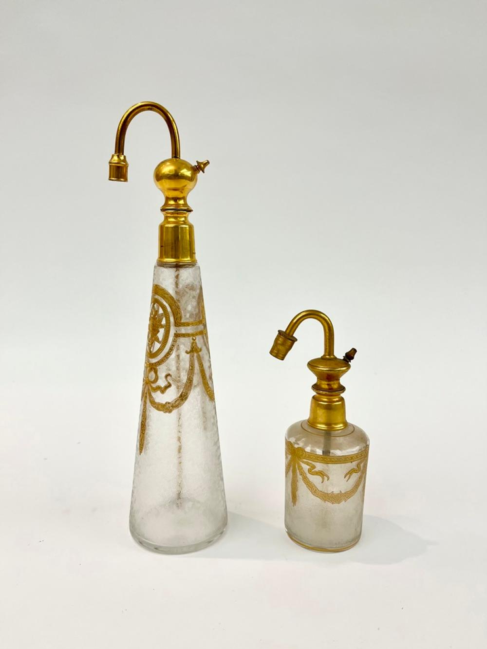 THREE EALRY 20TH CENTURY BACCARAT GILT-DECORATED CRYSTAL PERFUME ATOMIZERS