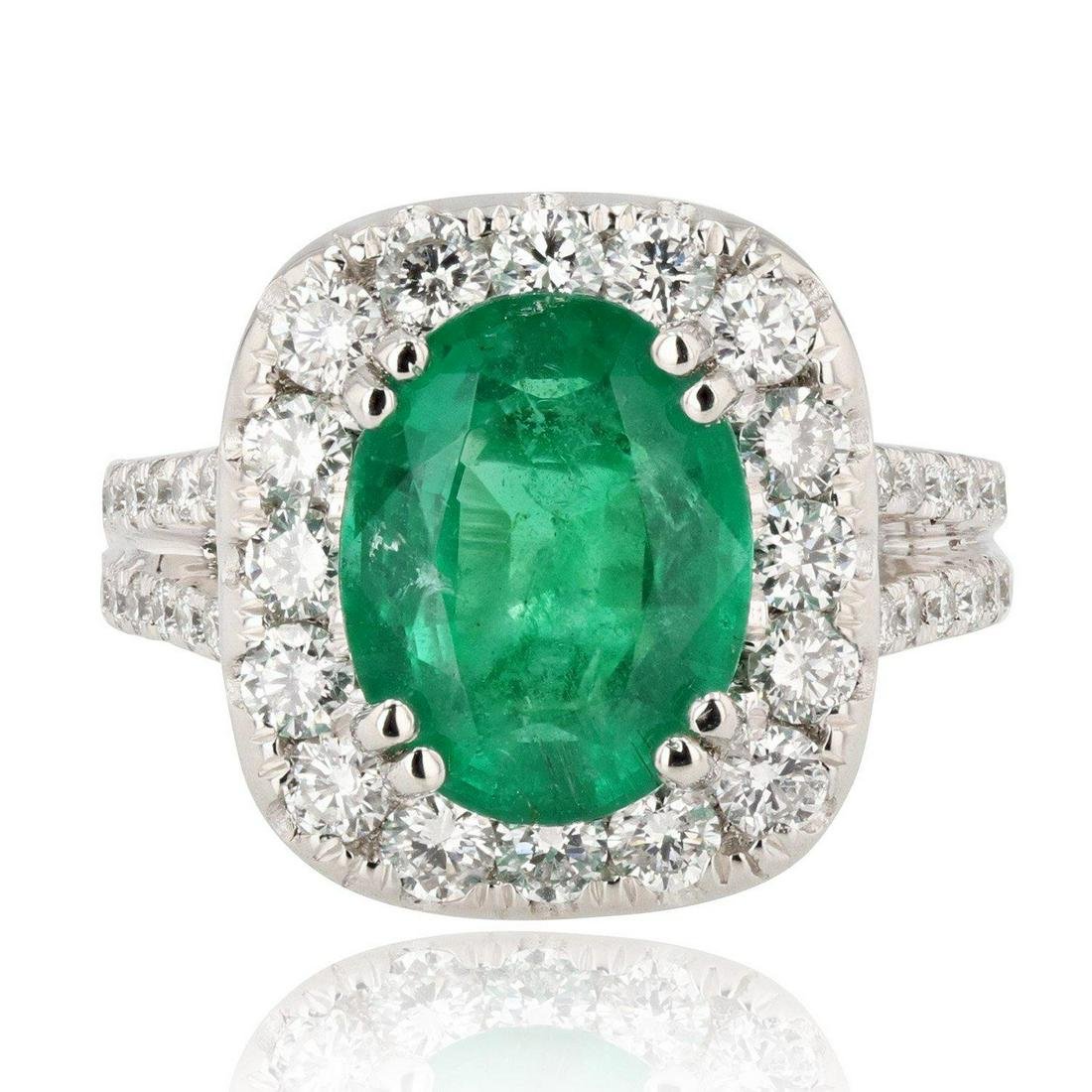 APP: 19.8k 3.92ct Emerald and 1.40ctw Diamond Platinum