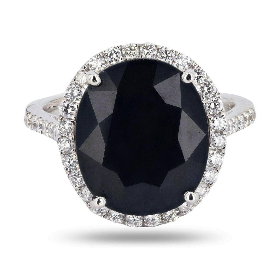 APP: 6.5k 8.93ct Blue Sapphire and 0.57ctw Diamond 18K