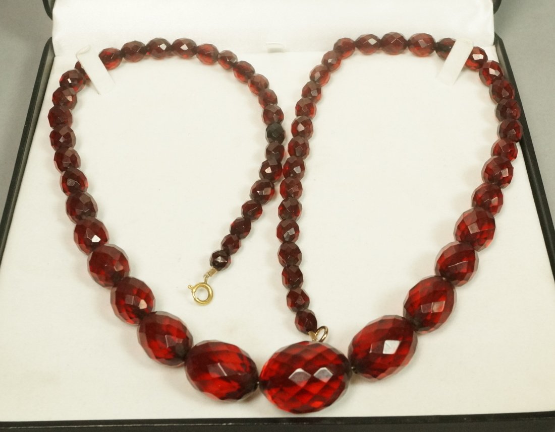 Long Graduated Amber Bead Necklace. Faceted Beads