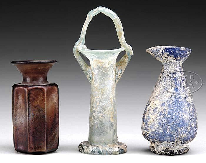 THREE ANCIENT GLASS VESSELS.