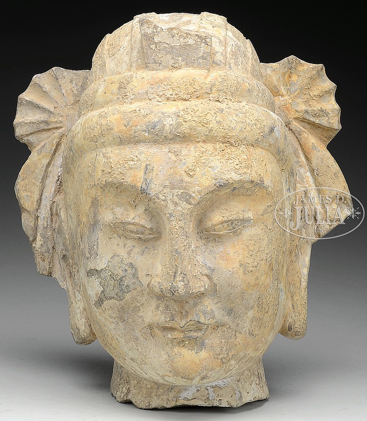 CARVED LIMESTONE HEAD OF BODASTAVIA.