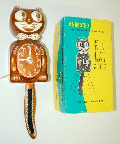 184: Jewelled Copper Kit Kat Clock in Original Box