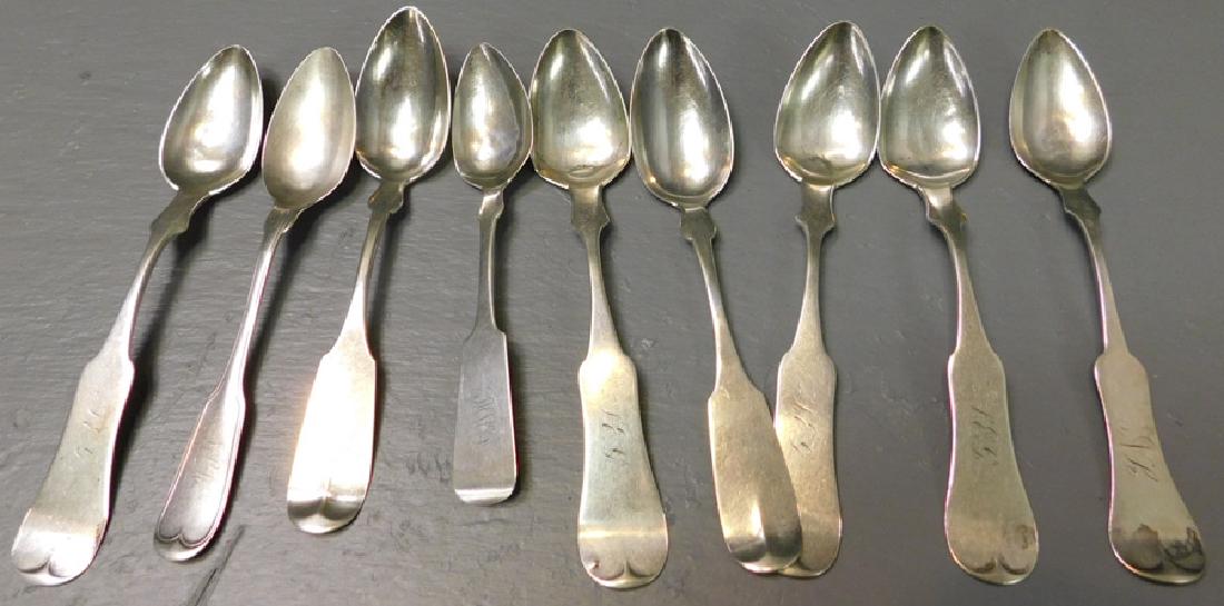 9 American coin silver tea spoons, various makers.