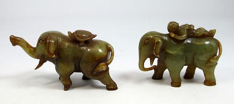 A PAIR OF CHINESE CARVED JADE ELEPHANT FIGURESF