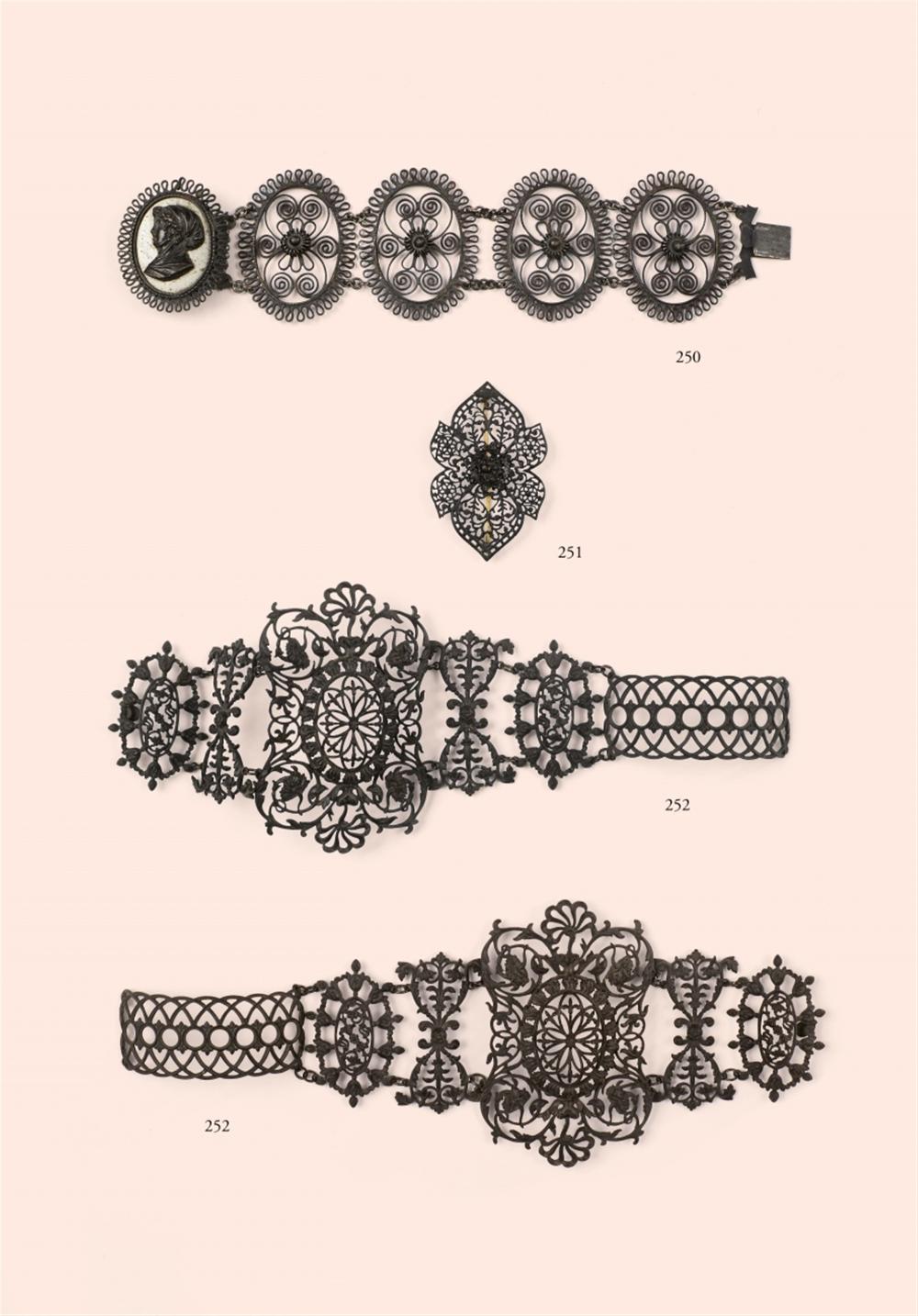 A floral cast iron brooch