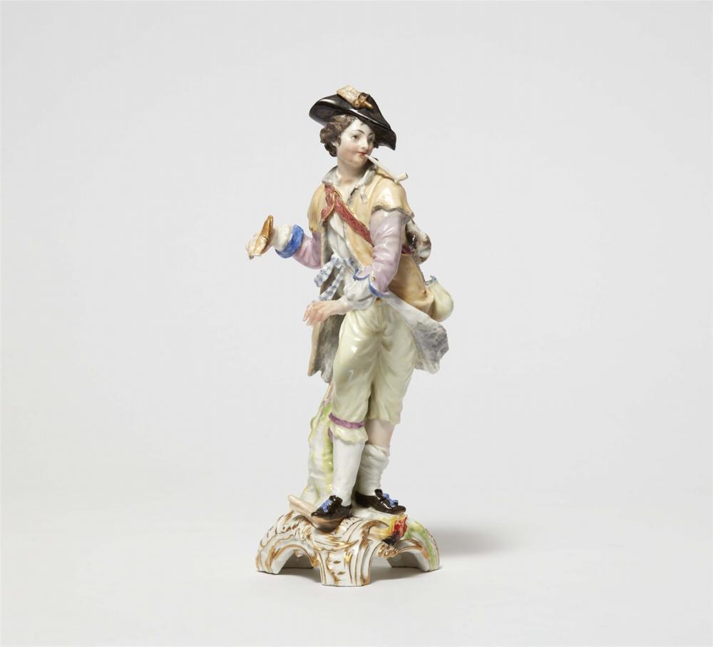 A Berlin KPM porcelain model of a shepherd with a pipe as an allegory of fire