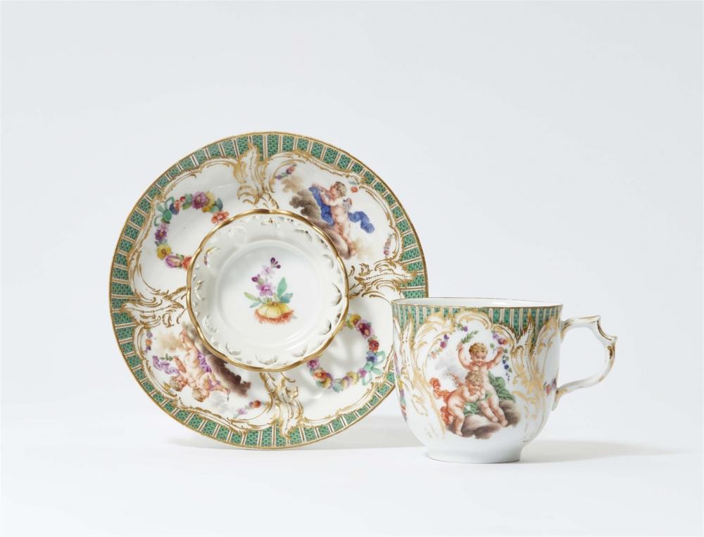 A Berlin KPM porcelain trembleuse with amoretti