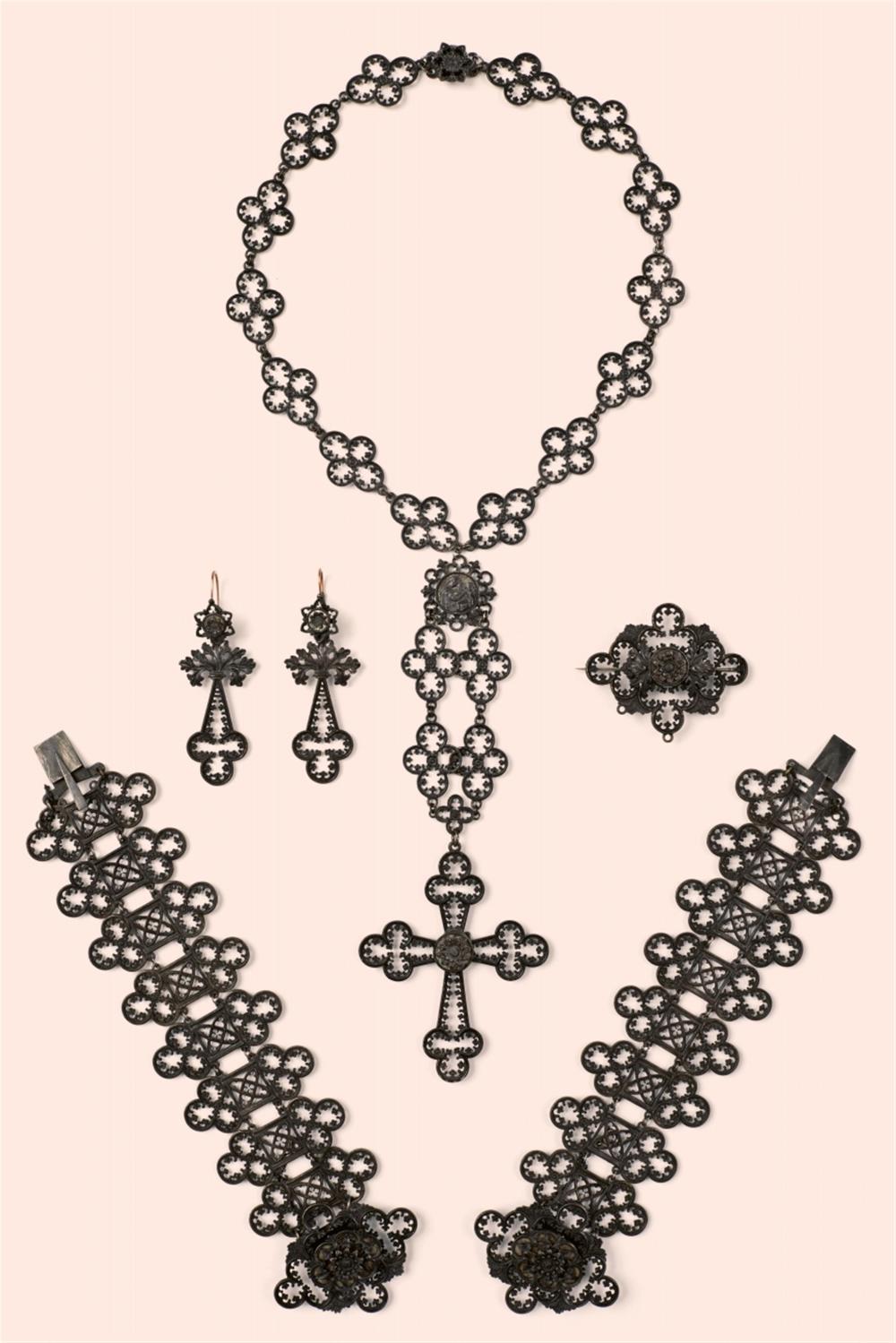 An important cast iron parure in the original box