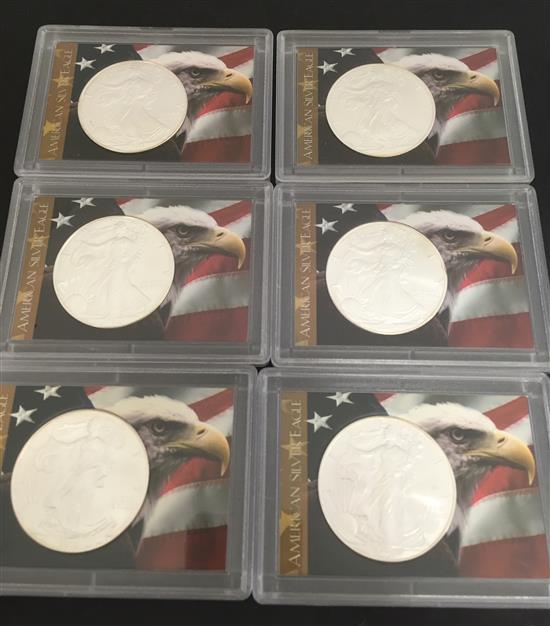 †6 AMERICAN SILVER EAGLES INCLUDING 2000, 2001, 2002, 2004, 2008, AND 2009 (ALL IN PROTECTIVE HARD CASE) *tax exempt*