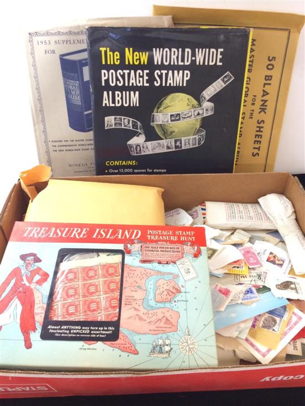 LOT CANCELLED STAMPS, STAMP ALBUMS, AND "THE NEW WORLD-WIDE POSTAGE STAMP ALBUM" WITH STAMPS