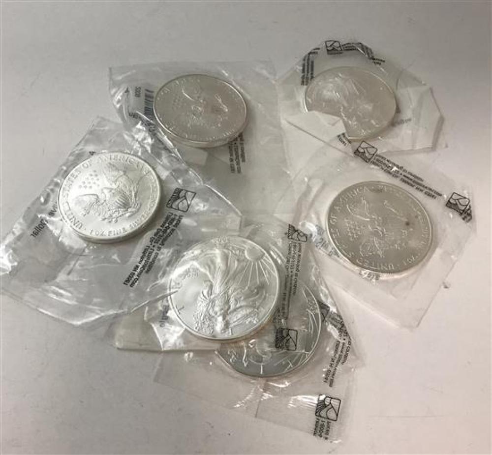 †6 UNCIRCULATED AMERICAN SILVER EAGLES INCLUDING 2001, 2003, 2004, 2006, 2007, AND 2009 (ALL LITTLETON) *tax exempt*