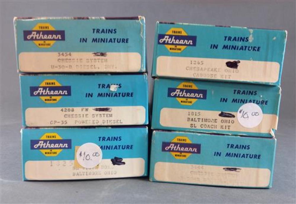 BOX LOT (6) ATHEARN HO SCALE MODEL TRAINS IN BOXES INCLUDING CHESAPEAKE OHIO CABOOSE KIT AND CHESSIE SYSTEM DIESEL ENGINE.