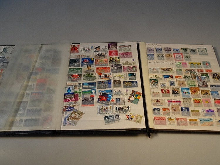Two stock books containing various world stamps.