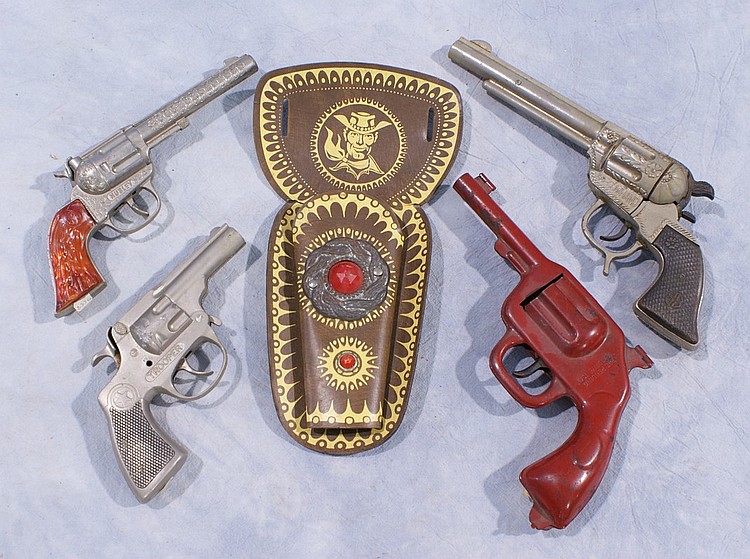 Cap gun lot including (4) guns