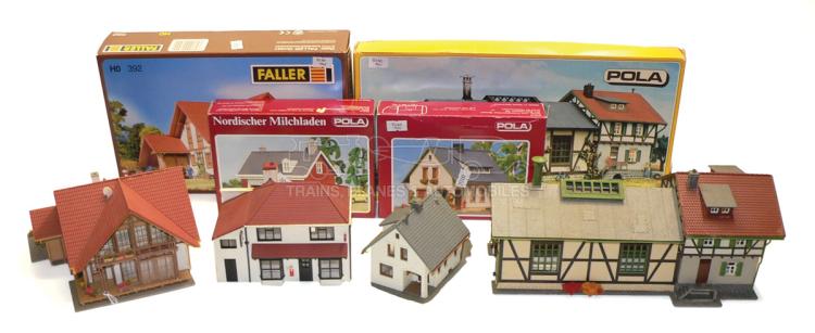 Four HO-scale kit-built Buildings