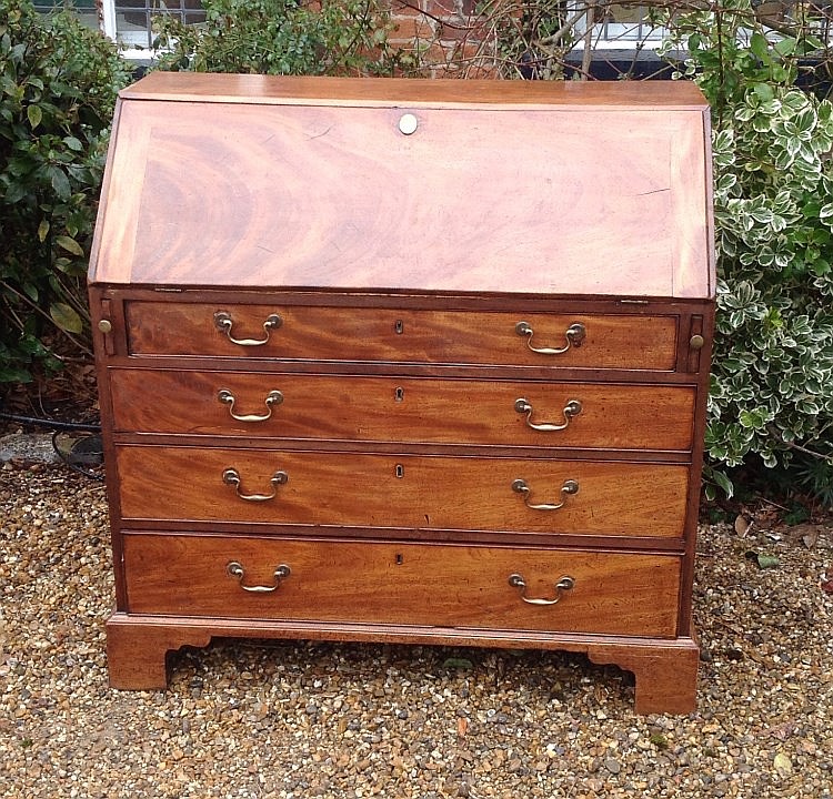 A GEORGIAN MAHOGANY FALL FRONT WRITING BUREAU