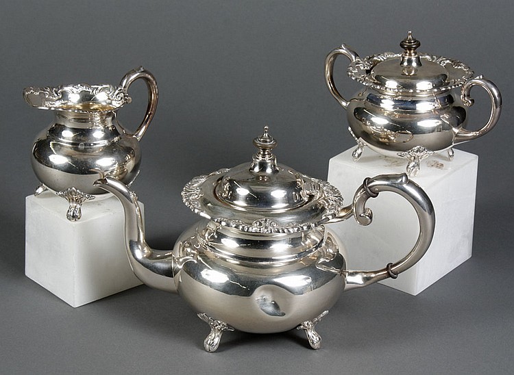 THREE PIECE STERLING SILVER VICTORIAN TEA SERVICE...