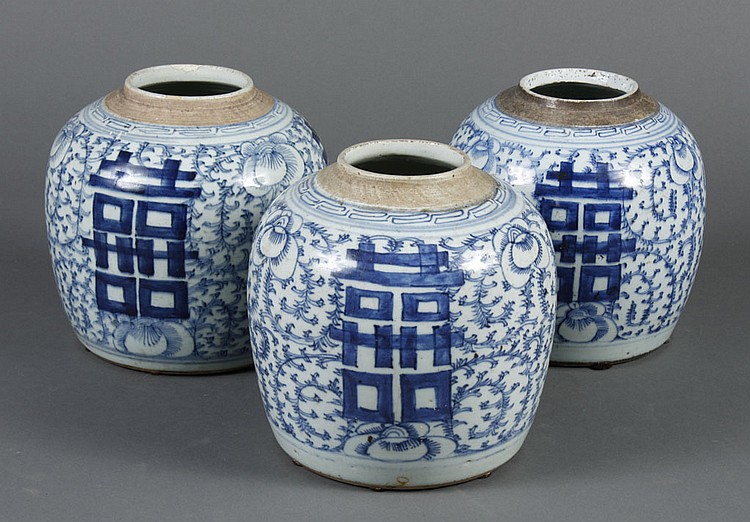 THREE CHINESE CERAMIC BLUE AND WHITE ROUND STORAGE JARS...