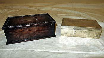 A hallmarked silver cigarette box with cedar