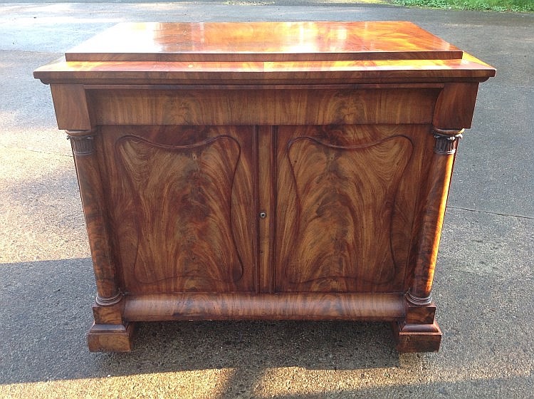 A George IV mahogany chiffonier, the rectangular plinth top with angled
