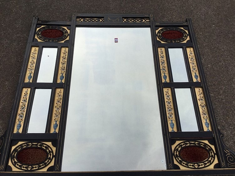 A late Victorian aesthetic ebonised overmantel, the mirror plates