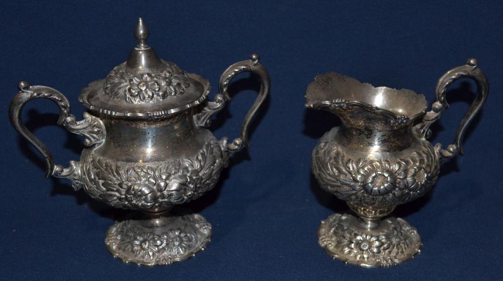 Stieff sterling silver hand chased cream pitcher and...