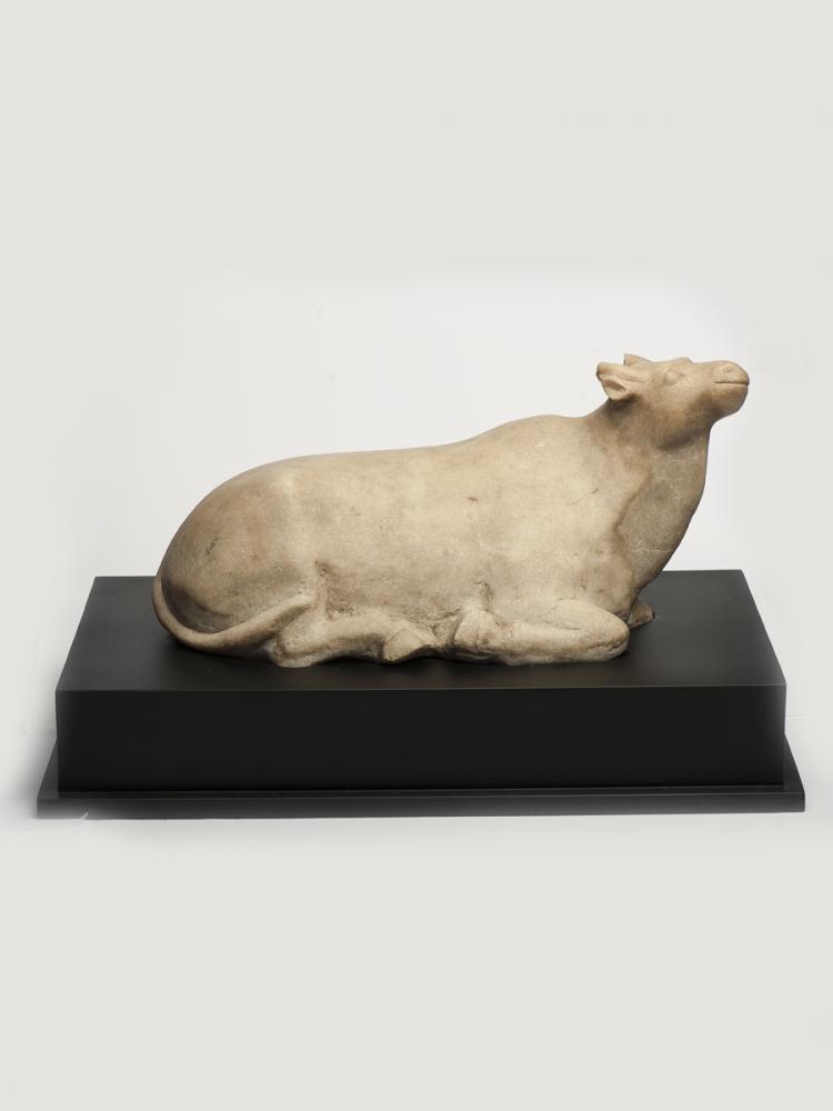 A MARBLE STONE CARVED OX STATUE