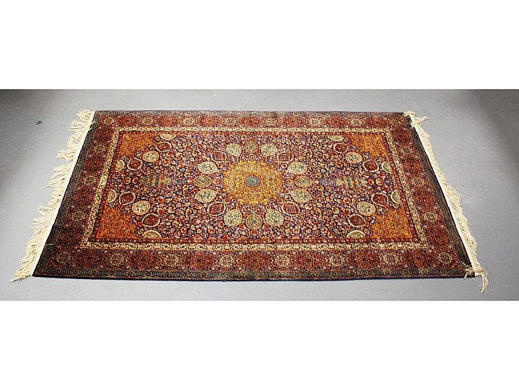 A 20th century Tabriz woollen rug, in the Ardabil