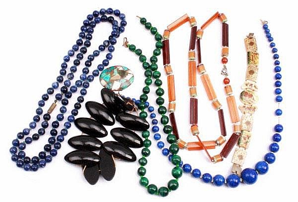 A string of blue jasper beads knotted strung a