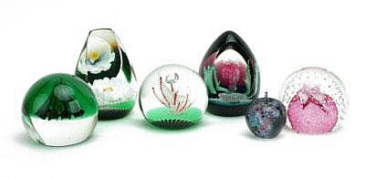 Five Caithness glass paperweights, including,