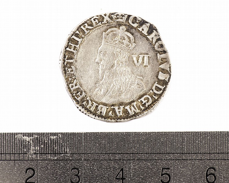 A Charles I sixpence,