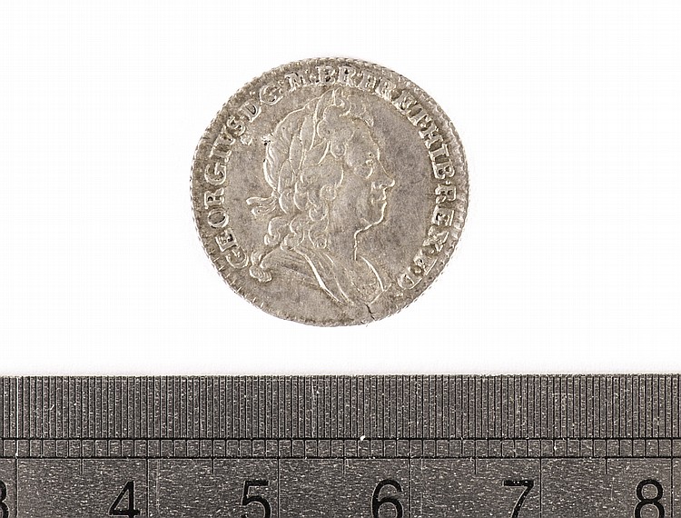 A George I sixpence,