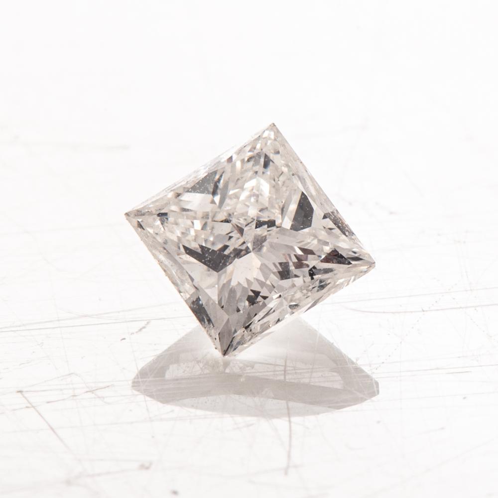 AN UNMOUNTED PRINCESS-CUT DIAMOND