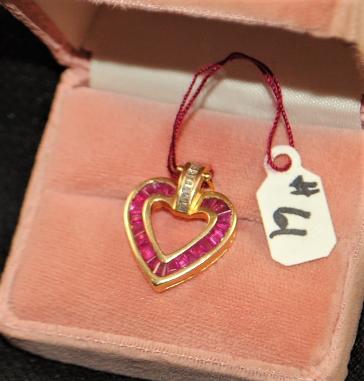 LADIES 14K (STAMPED) YELLOW GOLD DIAMOND AND RUBY PENDANT