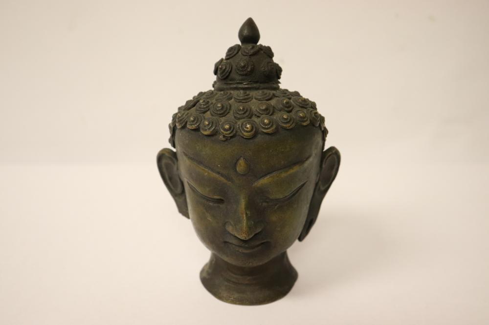 Antique bronze sculpture of Buddha head